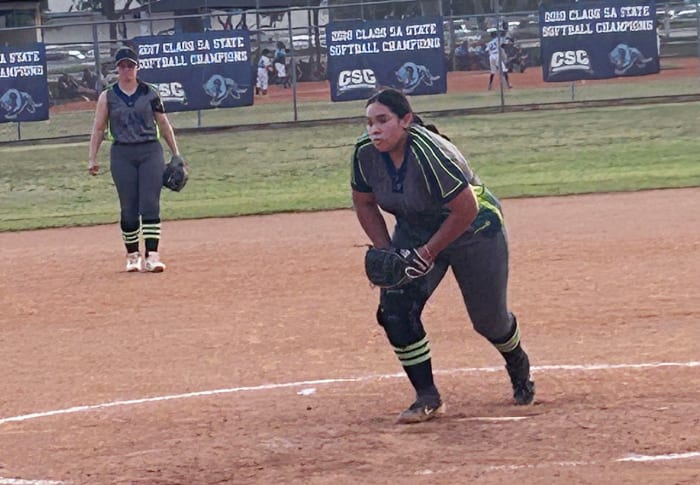 Miami SLAM's Abril Gomez starts her delivery early in Monday's contest against Coral Springs Charter.
